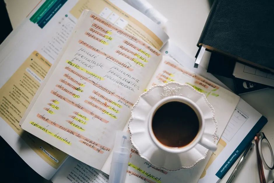 Two students studying grammar exercises at a desk — Photo by Leeloo The First on Pexels