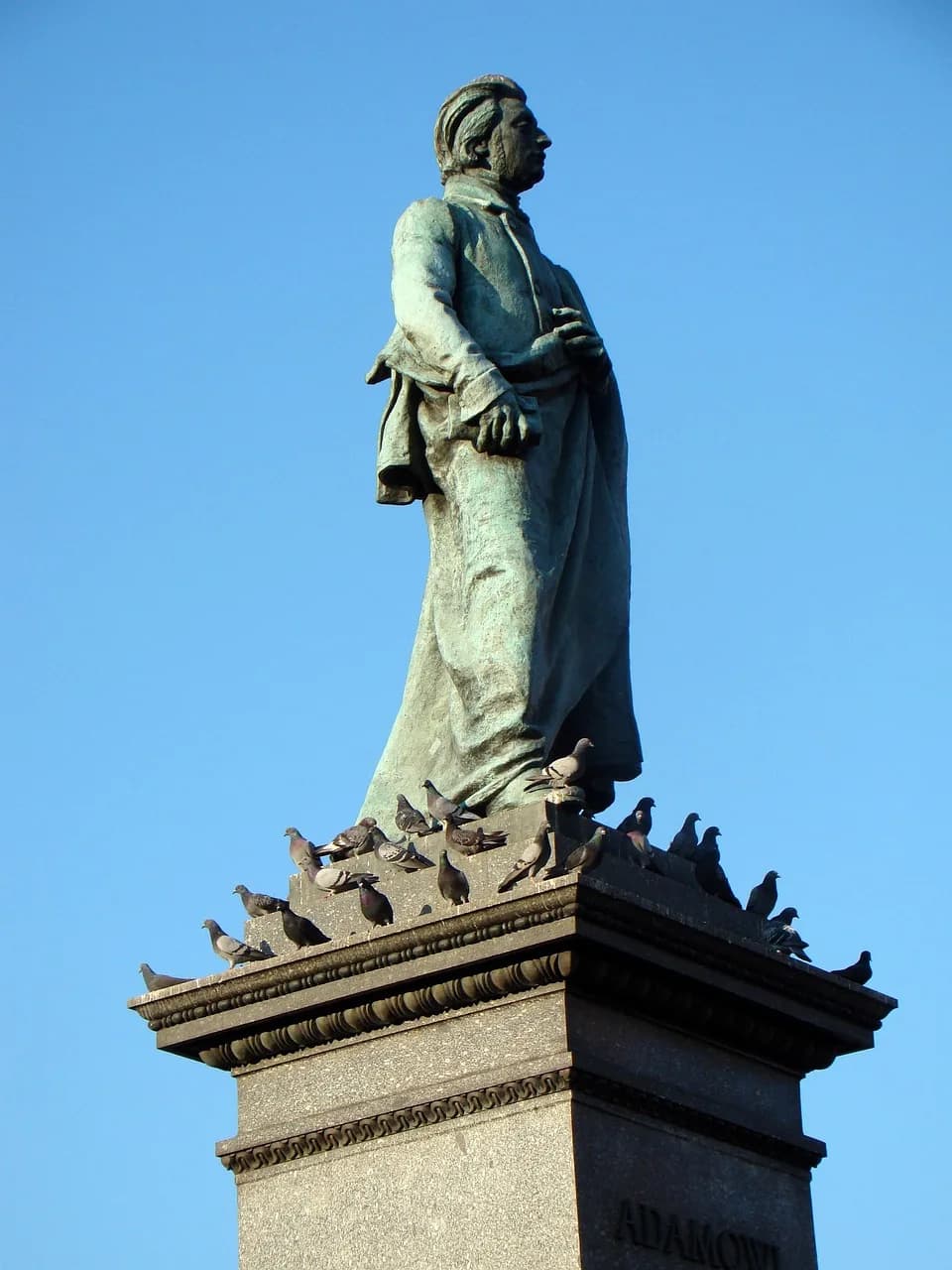 Adam Mickiewicz monument statue in Kraków's Main Market Square