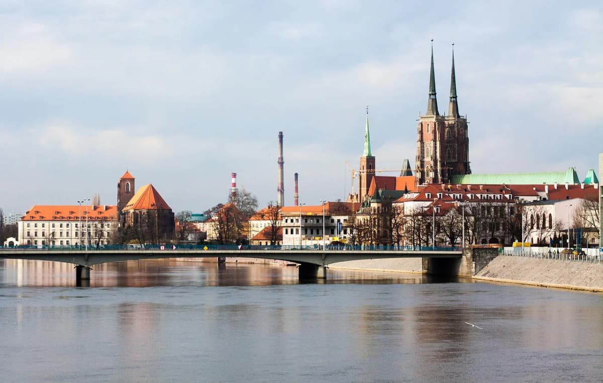 A riverside view in Wrocław with bridges crossing the Odra river