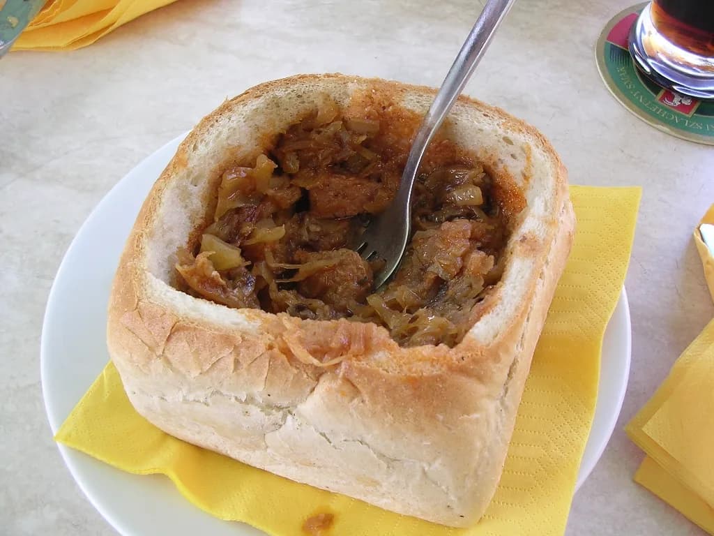 Bigos served in a hollowed-out bread bowl in Kraków's Rynek Główny