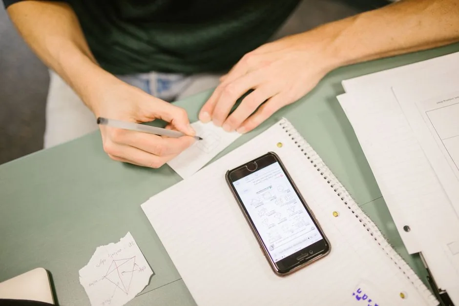 Free Polish case chart download — student using reference sheets and notes while studying — Photo by RDNE Stock project on Pexels