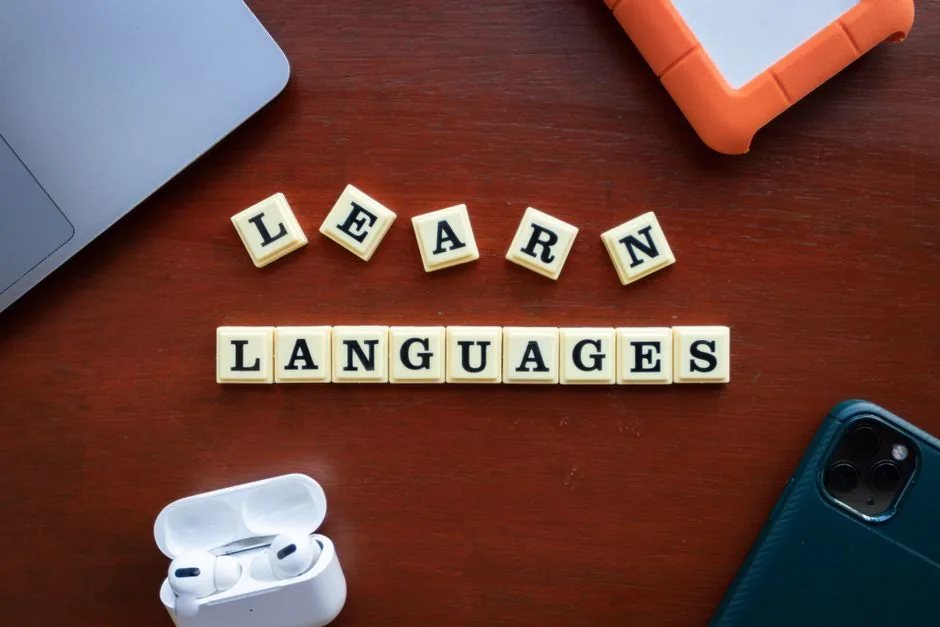 Person studying language learning materials with flashcards — Photo by Ling App on Pexels
