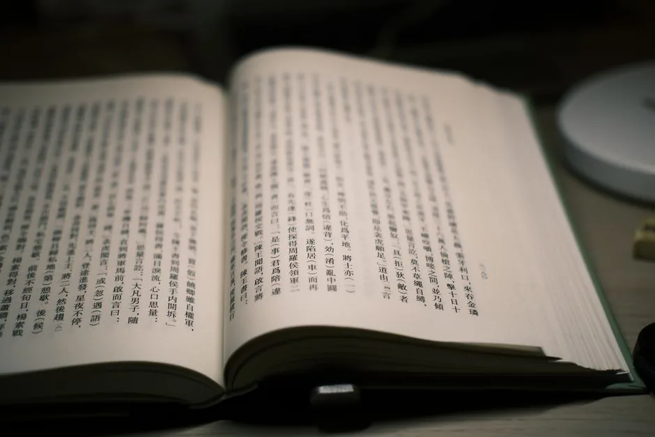 Language learning textbook open to reference pages — Photo by Manta paopao on Pexels