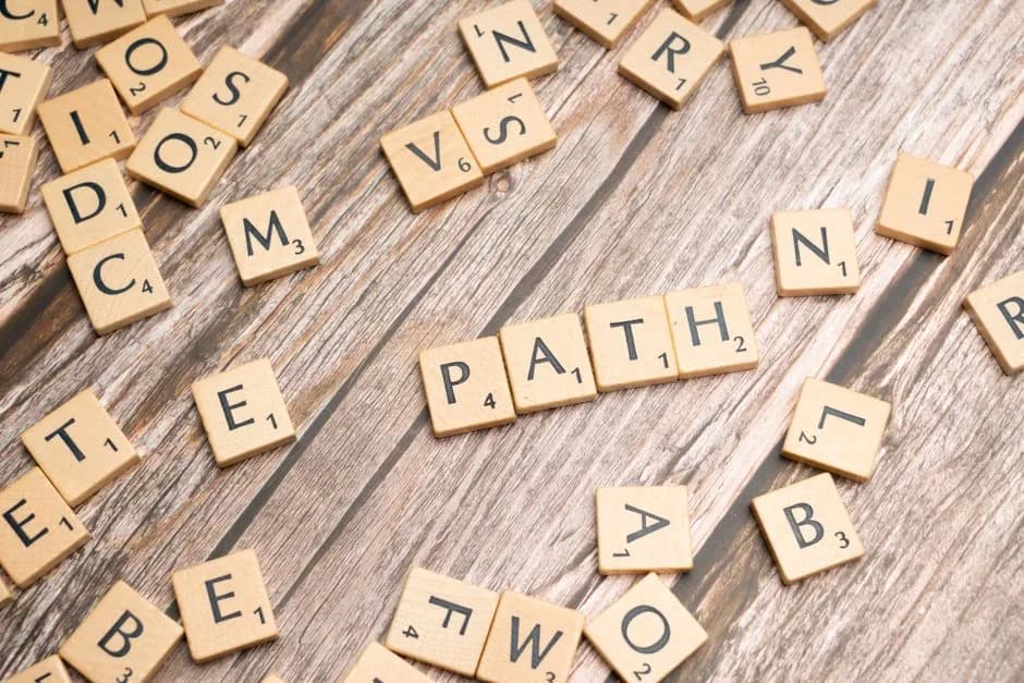 Language learning journey — Scrabble tiles spelling PATH — Photo by Markus Winkler on Pexels