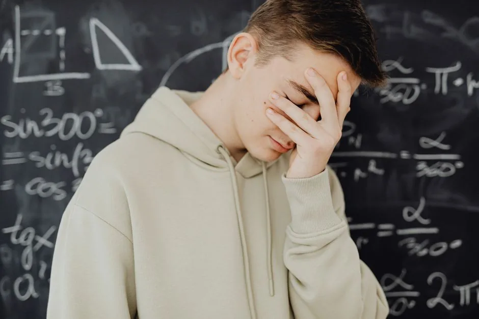 Confused student overwhelmed by a board full of equations — Photo by www.kaboompics.com on Pexels