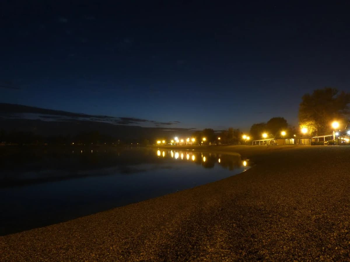 A misty lake at night in Poland, the kind of water where Polish folklore creatures like rusałka are said to appear