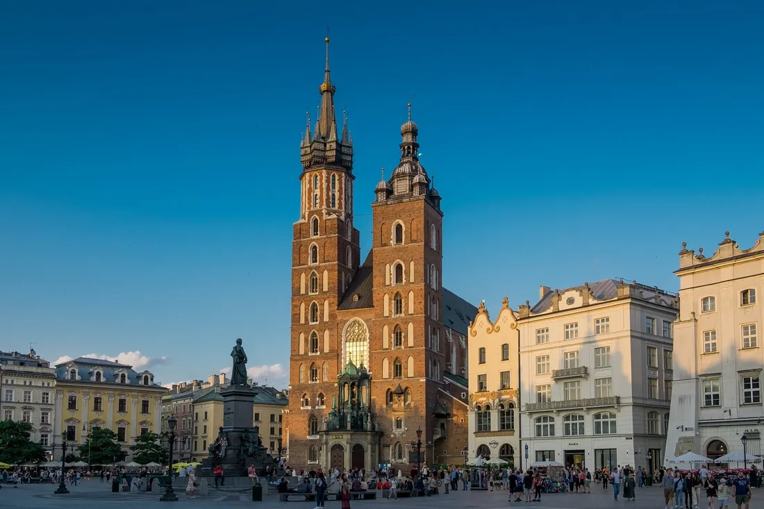 St. Mary's Basilica tower where the Hejnał Mariacki trumpet call is played, above Kraków's Main Market Square
