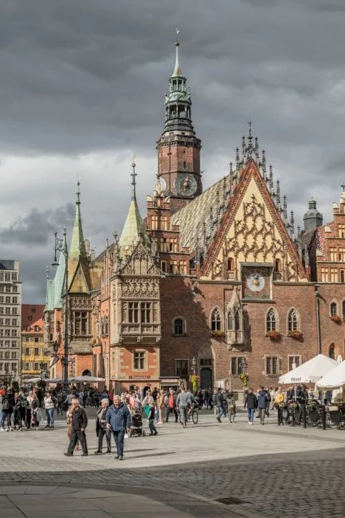 Wrocław City Hall and bustling Market Square, one of Poland's most beautiful city centers — Photo by SHOX ART on Pexels