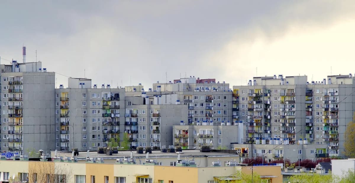 Communist-era housing estate in Warsaw, Poland, with rows of concrete apartment blocks