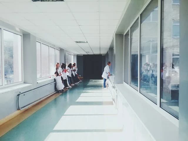 Warsaw hospital corridor representing Krzysztof Komeda's medical career and final days