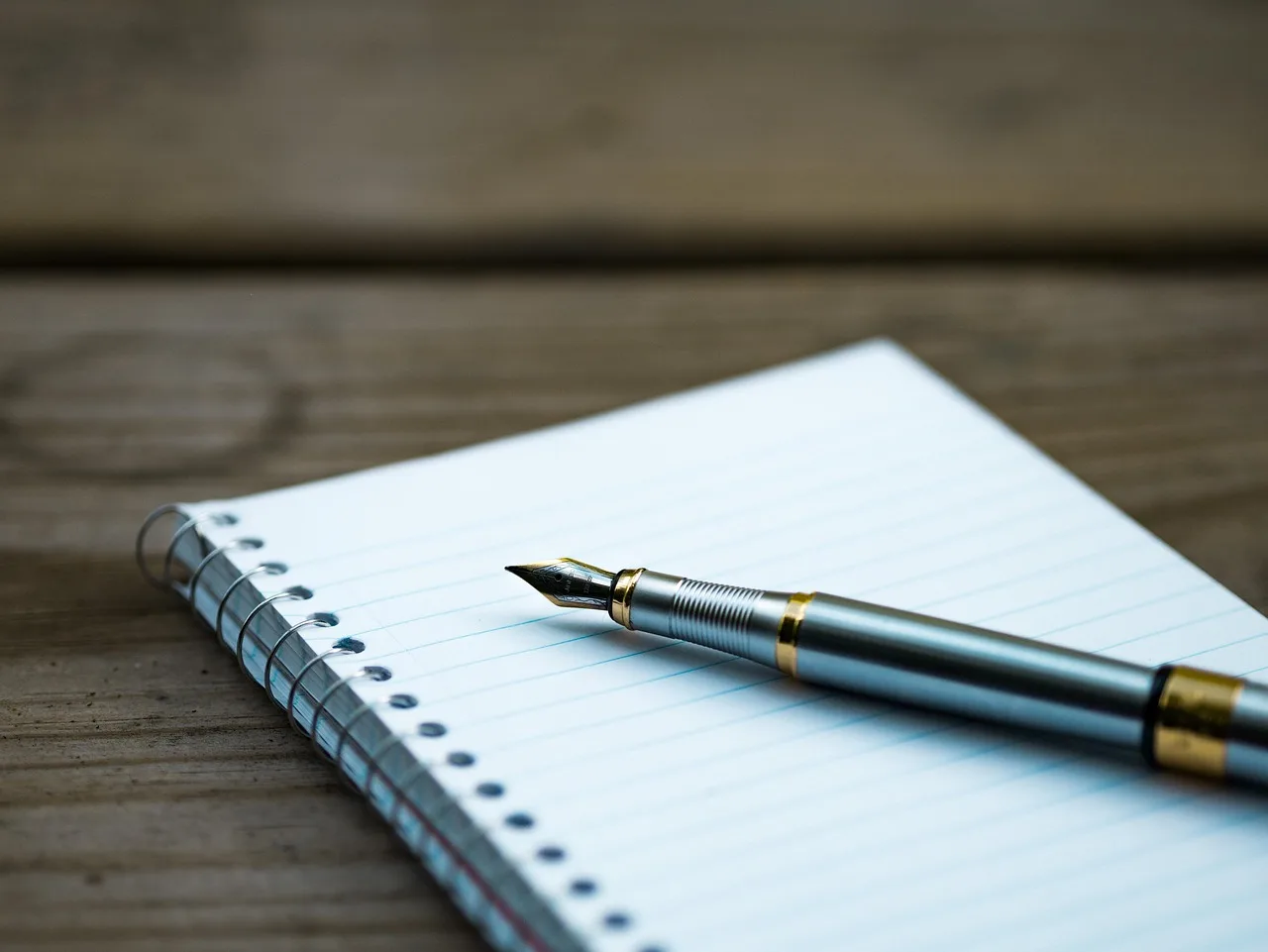 A notebook and pen ready for jotting down new essential Polish phrases while traveling