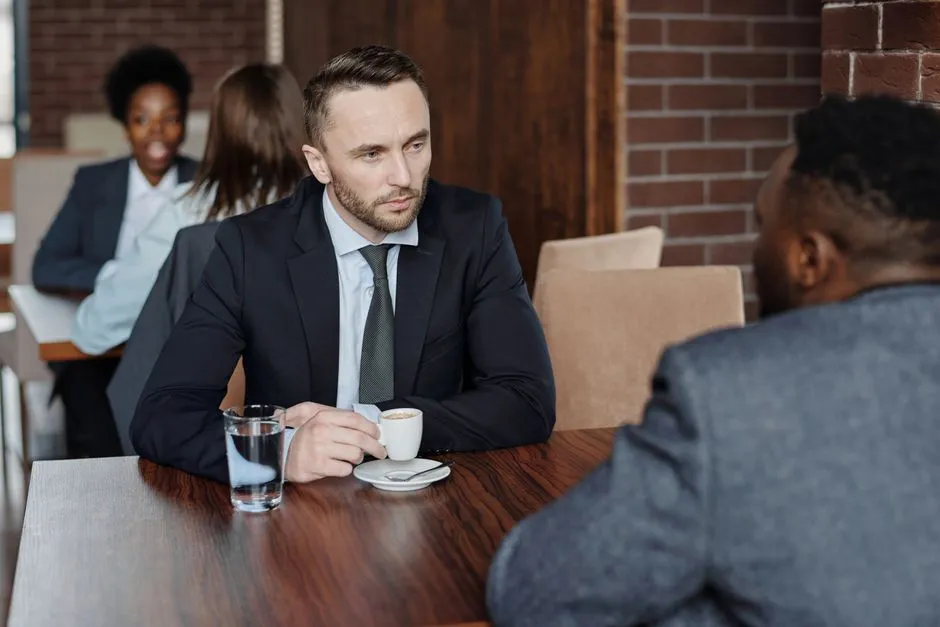 Two people practicing Polish pronunciation in conversation — Photo by August de Richelieu on Pexels
