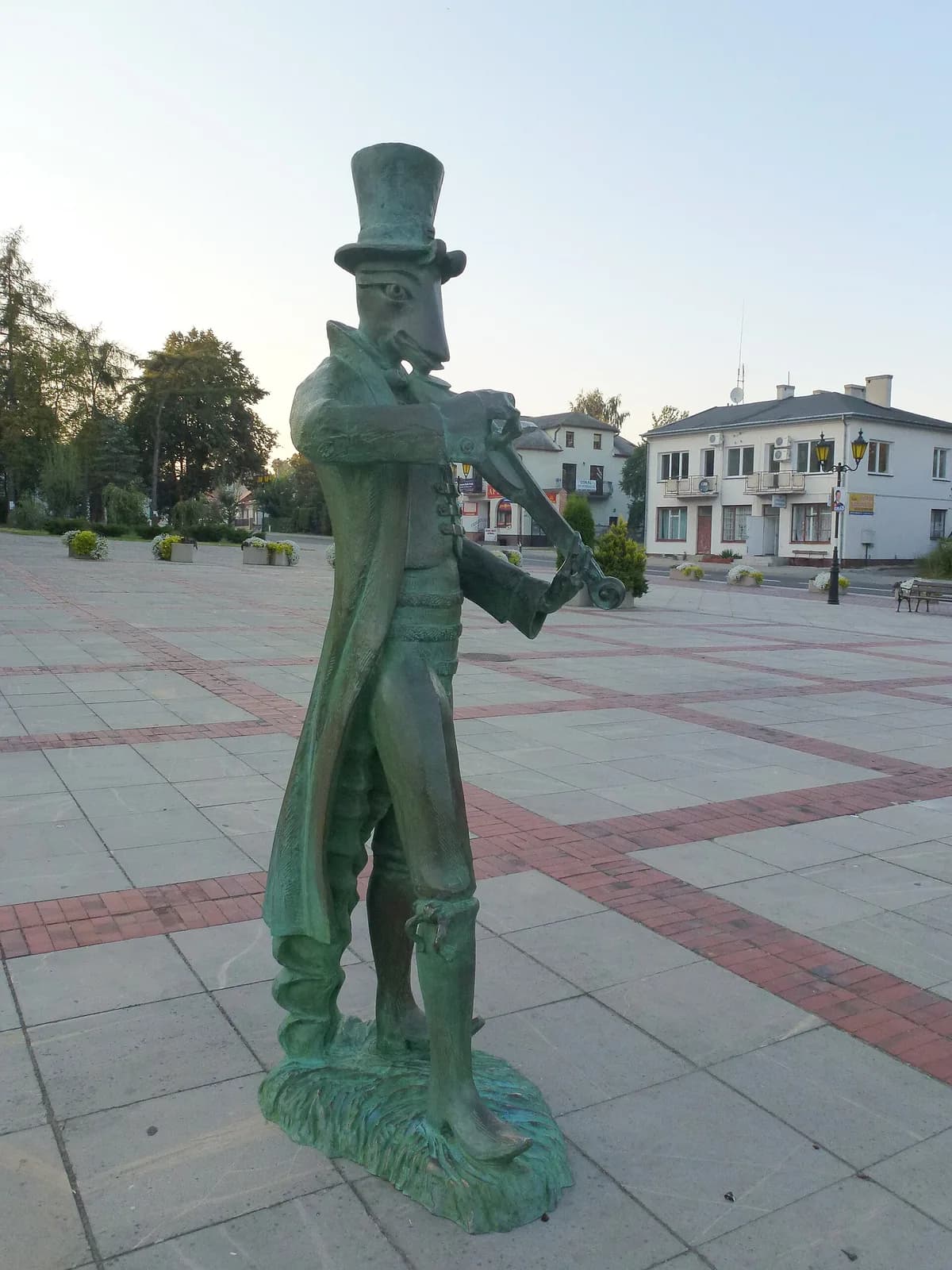 A bronze statue of a beetle playing violin in Szczebrzeszyn, Poland, home of the country's most famous polish tongue twisters