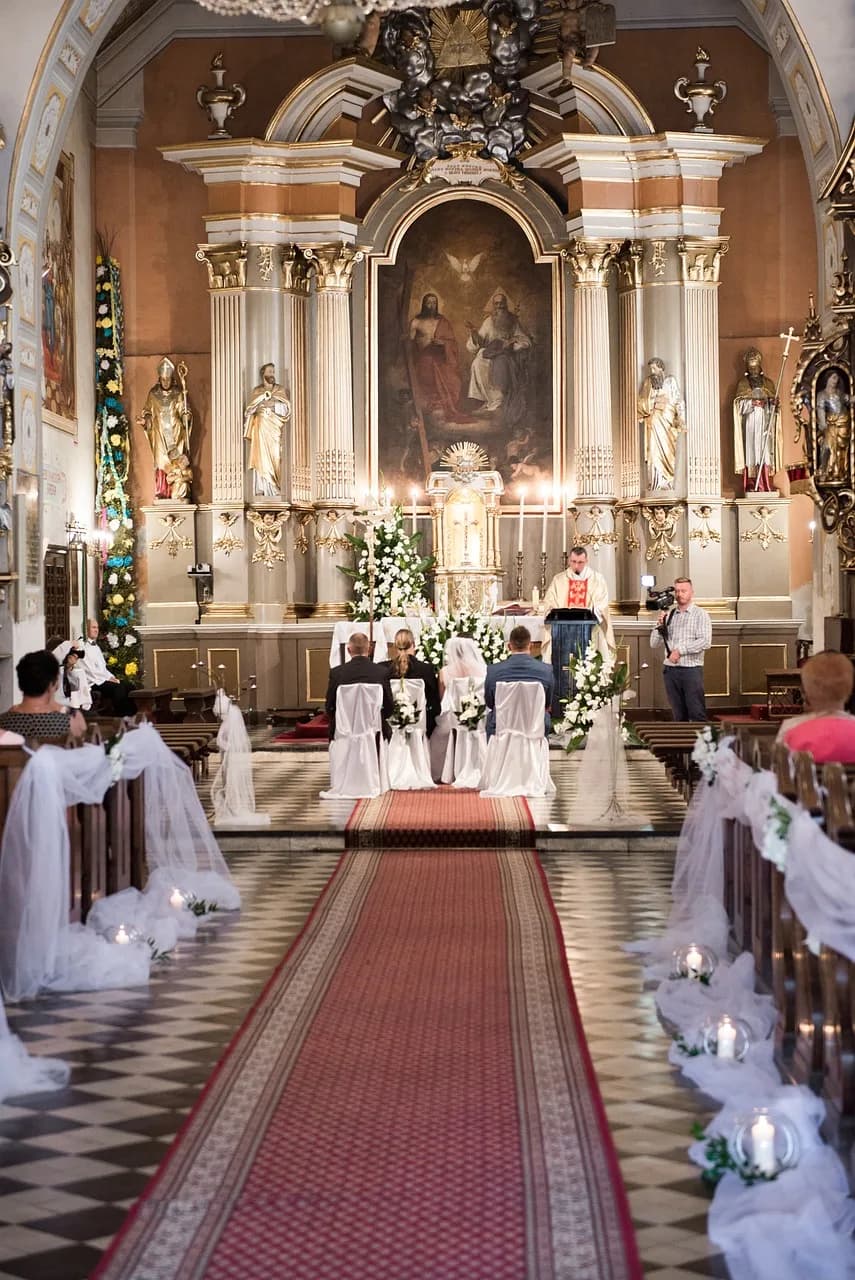 Polish wedding traditions: bride and groom at the altar during a traditional Polish Catholic church wedding ceremony