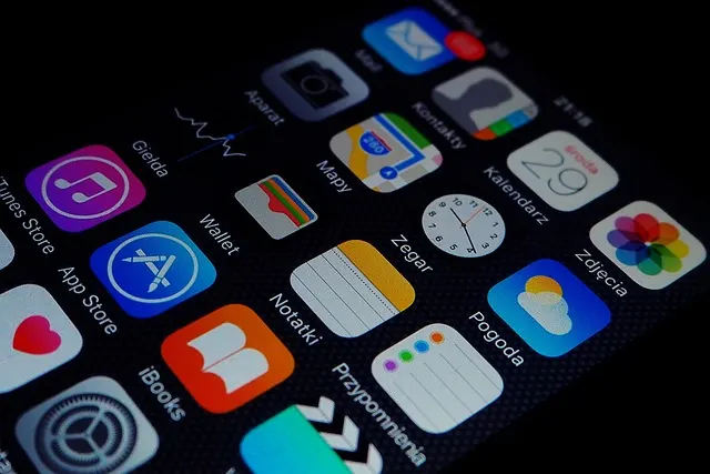 A smartphone home screen showing various app icons — the question this review answers is whether is duolingo good for learning polish or just for building a habit