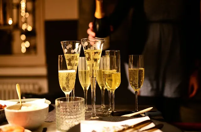 Champagne glasses filled and ready for a toast, the traditional way a studniówka ball begins