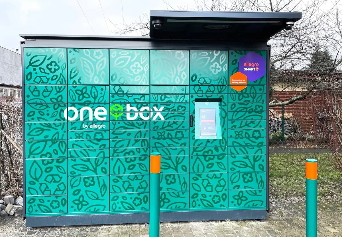 A green Allegro One Box parcel locker, part of the delivery network behind Poland's dominant allegro marketplace