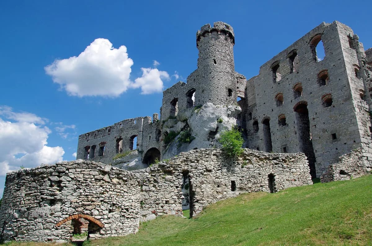 The ruins of Ogrodzieniec Castle in Poland, a real filming location tied to the Witcher's Polish origins
