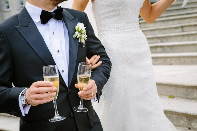 A wedding toast with small glasses of homemade Polish liqueur