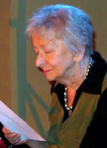 A close-up profile photograph of Wislawa Szymborska
