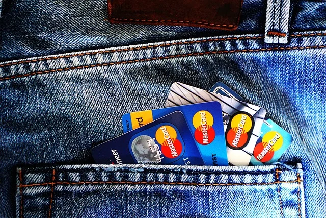 Bank cards in a pocket, representing the Polish bank account required for BLIK access